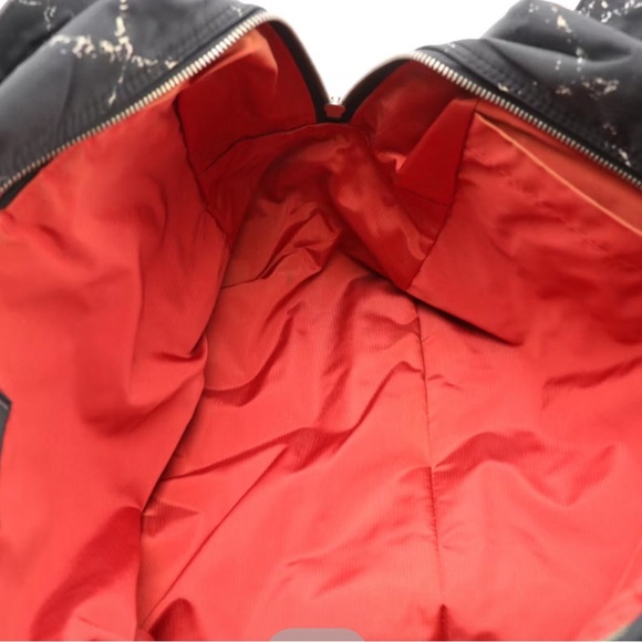 CHANEL Black Quilted Travel Bag with Diamond Pattern - Picture 4 of 16